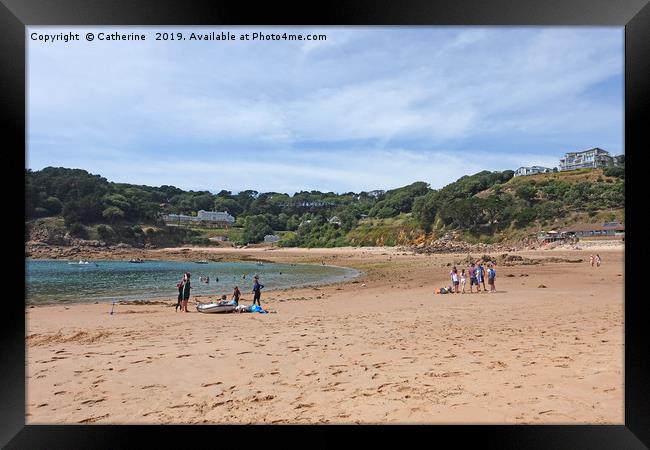 Portelet Bay, Jersey 21 July 2019: Holiday makers  Framed Print by Rocklights 