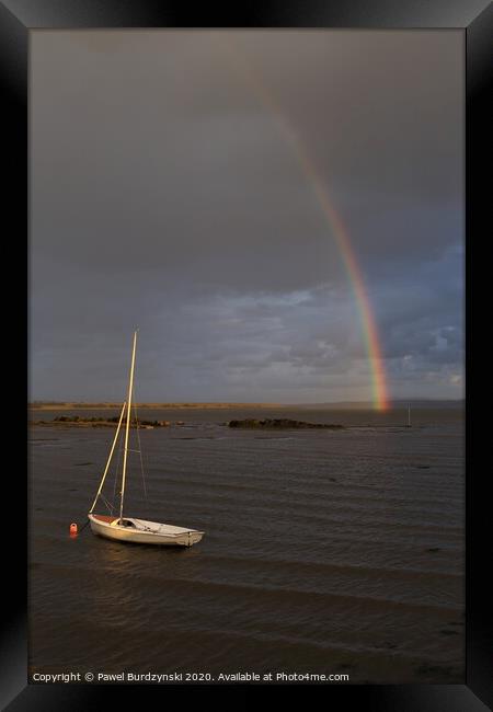 The rainbow over a boat Framed Print by Pawel Burdzynski