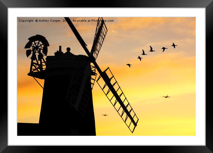 Windmill fly past. Framed Mounted Print by Ashley Cooper