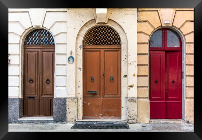 Three vintage wooden doors Framed Print by Jelena Maksimova