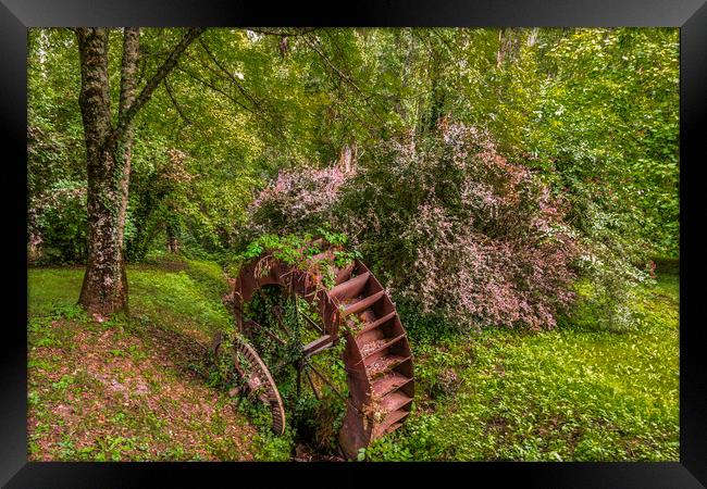 old rustic mill wheel in ax-les-thermes forest Framed Print by Mario Koufios