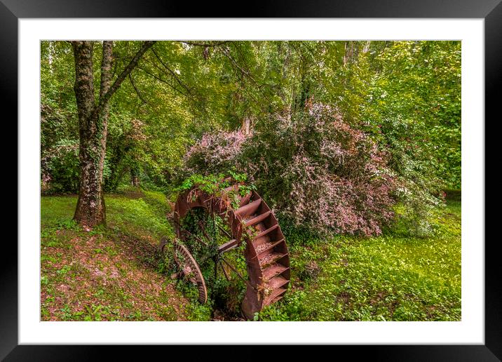 old rustic mill wheel in ax-les-thermes forest Framed Mounted Print by Mario Koufios