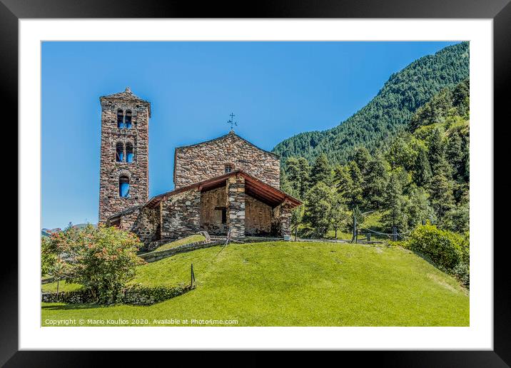Hilltop and stone church facade in the Pyrenees. Andorra Europe Framed Mounted Print by Mario Koufios