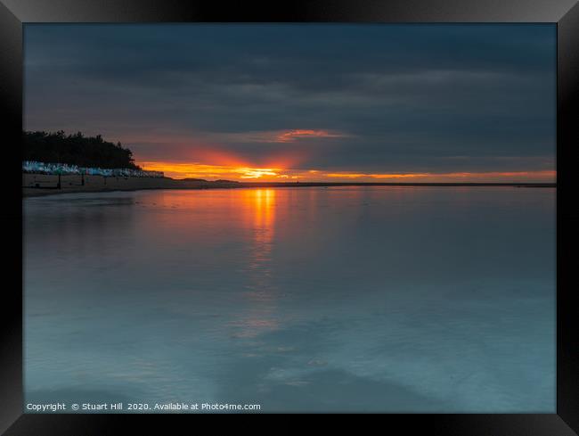 Sunset over calm water at Wells Next the Sea Framed Print by Stuart Hill