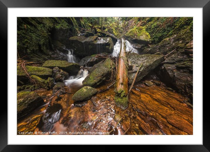 The Log In The Waterfall Framed Mounted Print by Ronnie Reffin