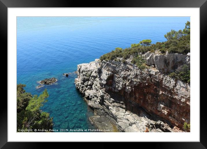 Rockface and bay on Lokrum island Framed Mounted Print by Andrew Reece