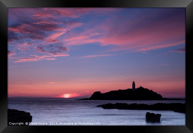 Godrevy lighthouse at sunset Framed Print by David Moore