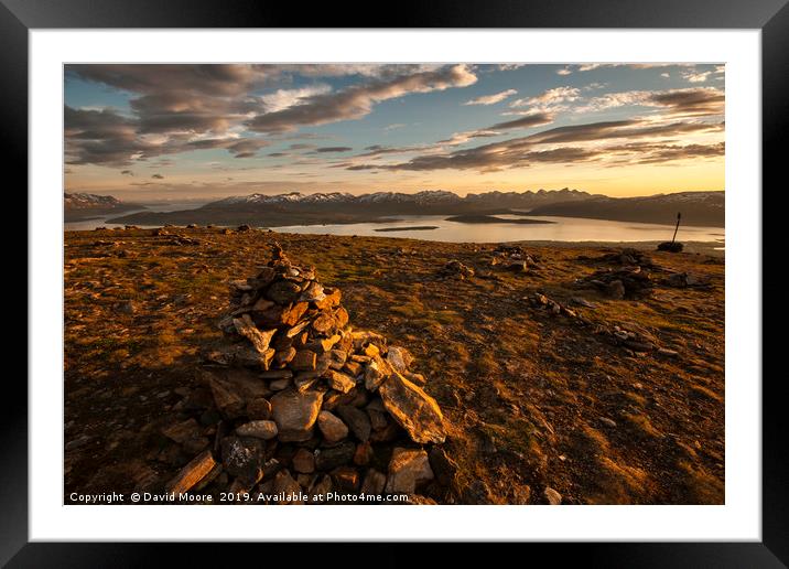 Midnight sun on mountain above Tromso Framed Mounted Print by David Moore