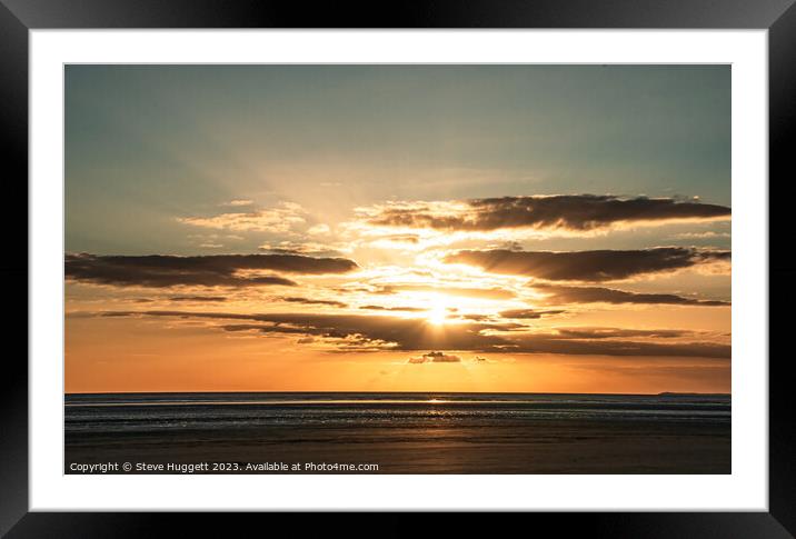 Sunset with  Rays bracking through the cloud at Pembrey Beach Wales Framed Mounted Print by Steve Huggett