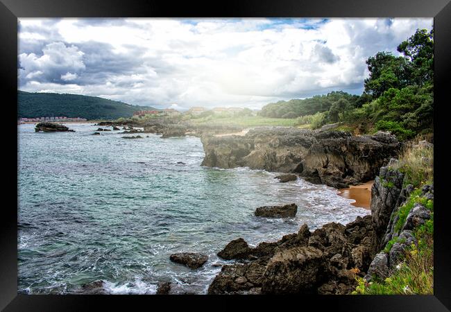 nice view of the sea coast with stones in the water Framed Print by David Galindo