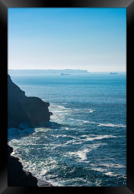 coastline cut into the ocean with boats and lighthouse Cabo Mayor Framed Print by David Galindo