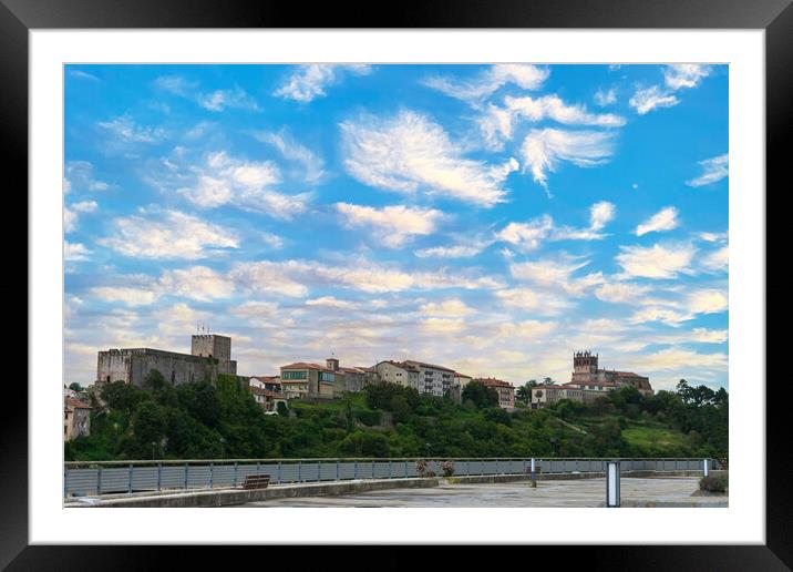 seaside town skyline with castle Framed Mounted Print by David Galindo