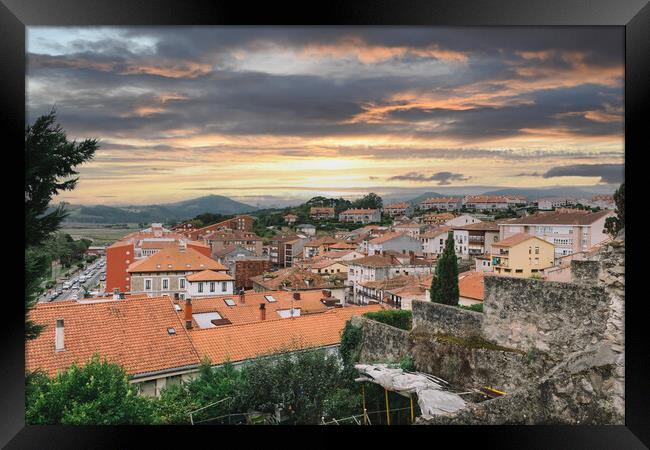 view of medieval city in Spain with colorful sky Framed Print by David Galindo