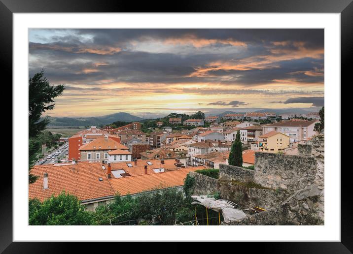 view of medieval city in Spain with colorful sky Framed Mounted Print by David Galindo