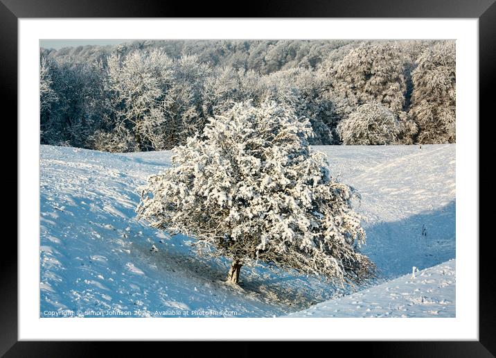 The leaning tree in winter Snow Framed Mounted Print by Simon Johnson