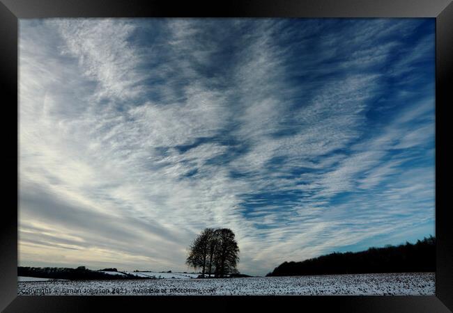 Trees clouds and sky Framed Print by Simon Johnson