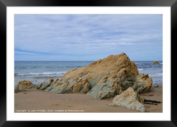 Rock Erupts Through the Sandy Beach, Towyn Farm, W Framed Mounted Print by Liam Neon