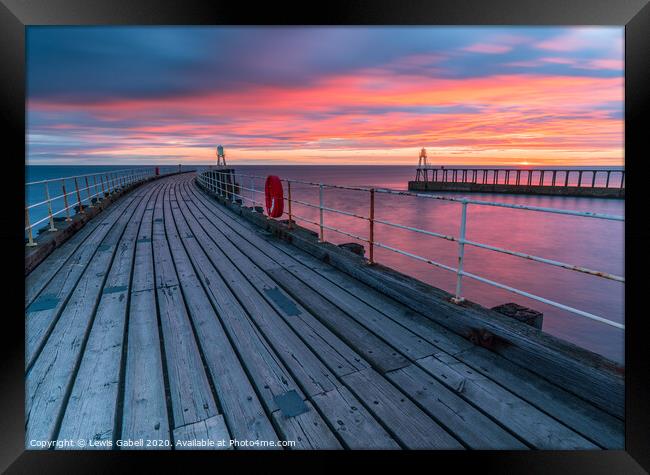 Fiery Sunrise at Whitby Pier, Yorkshire, UK Framed Print by Lewis Gabell