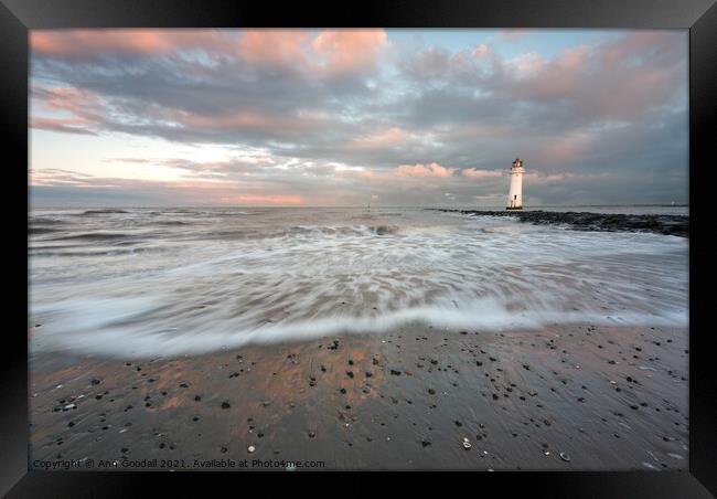 Incoming tide at Perch Rock lighthouse Framed Print by Ann Goodall