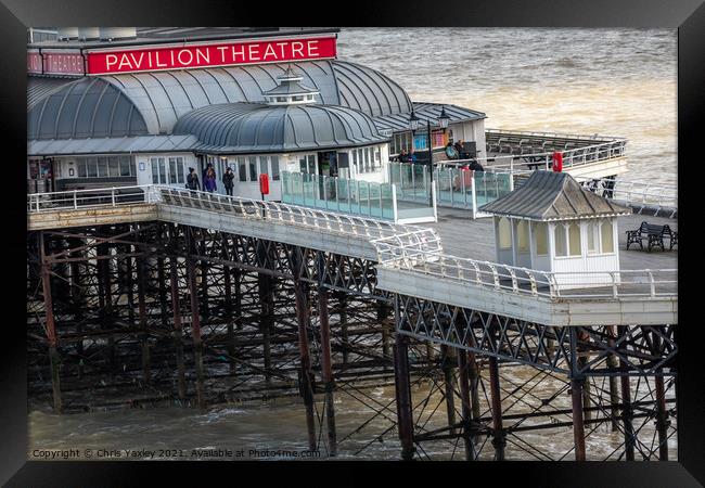 View along Cromer pier on the North Norfolk coast Framed Print by Chris Yaxley