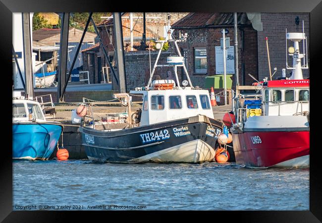 Commercial fishing boats in the port of Wells-Next-The-Sea, North Norfolk Framed Print by Chris Yaxley