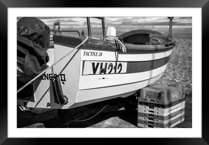 Close up of a fishing boat on Cromer beach in black and white Framed Mounted Print by Chris Yaxley