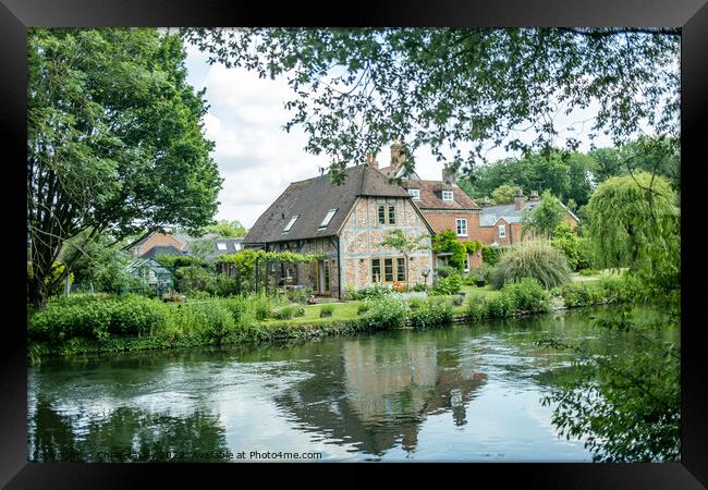 Quaint riverside cottage on the bank of the River Test, Hampshire Framed Print by Chris Yaxley