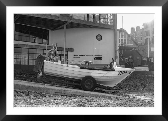 Traditional sea fishing boat outside the RNLI Henry Blogg Museum, Cromer Framed Mounted Print by Chris Yaxley