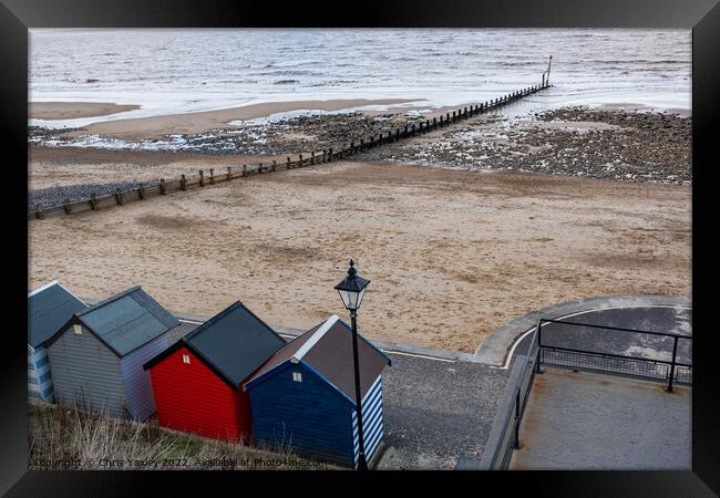 Beach huts on the prom Framed Print by Chris Yaxley