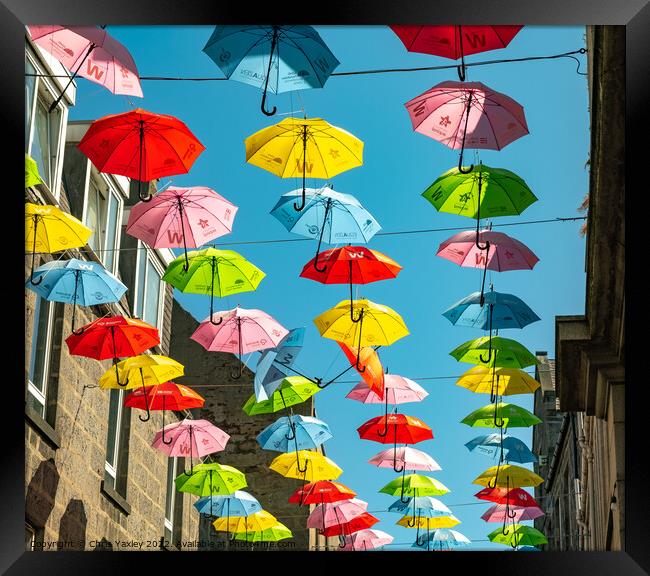 Colourful umbrellas in Aberdeen Framed Print by Chris Yaxley