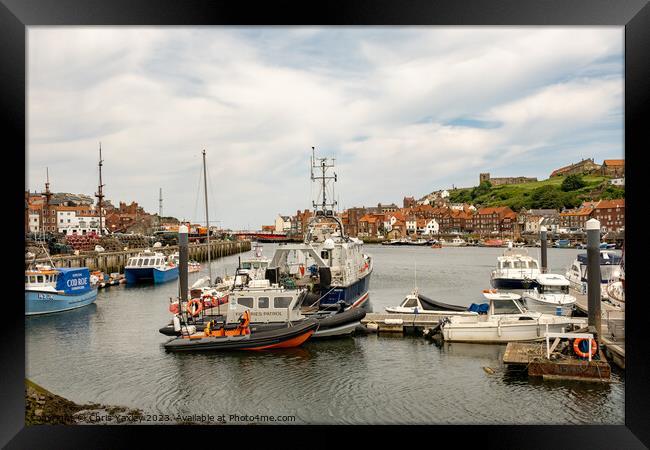 Boats moored up in Whitby marina Framed Print by Chris Yaxley