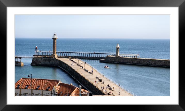 The Piers in Whitby harbour Framed Mounted Print by Chris Yaxley