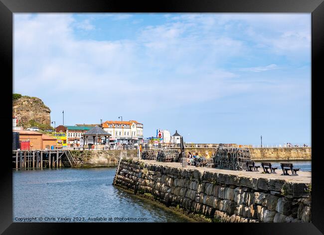 Tate Hill Pier in Whitby harbour Framed Print by Chris Yaxley