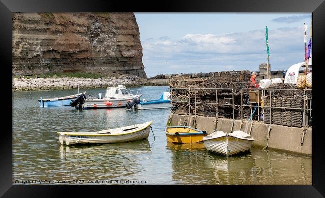 Fishing boats in Staithes Harbour Framed Print by Chris Yaxley