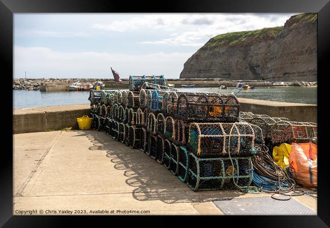 Fishing in Staithes Framed Print by Chris Yaxley