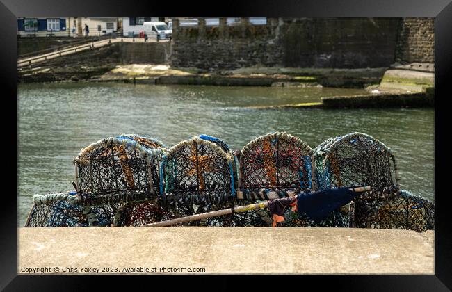 Crab pots in the fishing village of Staithes, North Yorkshire Framed Print by Chris Yaxley