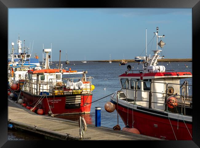 Close up of fishing boats in the harbour Framed Print by Chris Yaxley