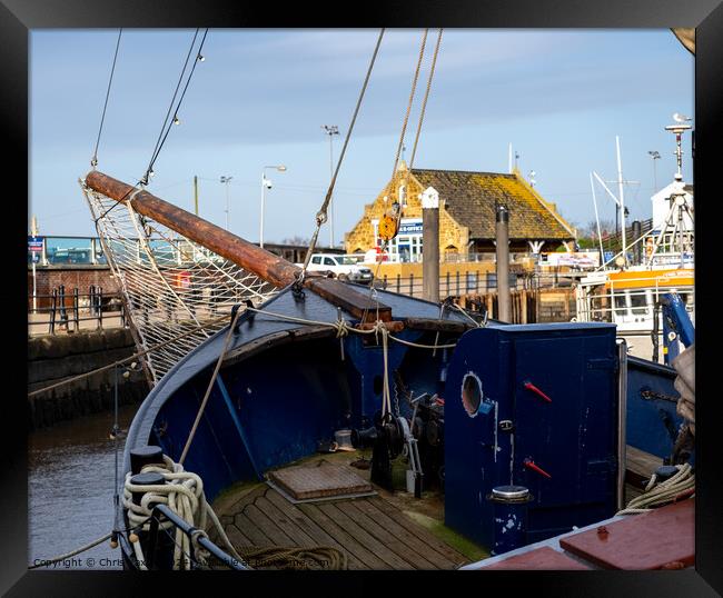 The bow of a sailing boat Framed Print by Chris Yaxley