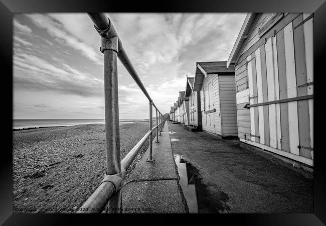 Row of beach huts on Cromer promenade Framed Print by Chris Yaxley