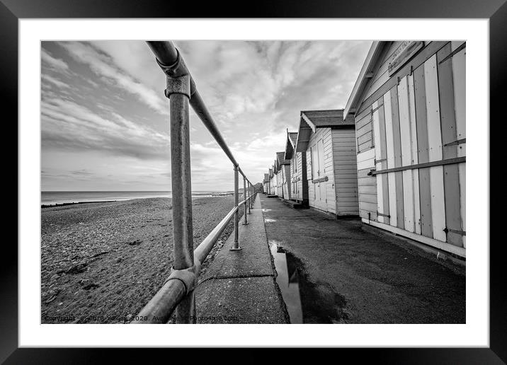 Row of beach huts on Cromer promenade Framed Mounted Print by Chris Yaxley