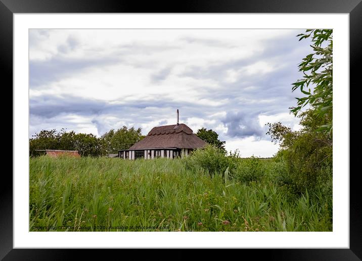 Holiday let on the River Bure in the Norfolk Broad Framed Mounted Print by Chris Yaxley
