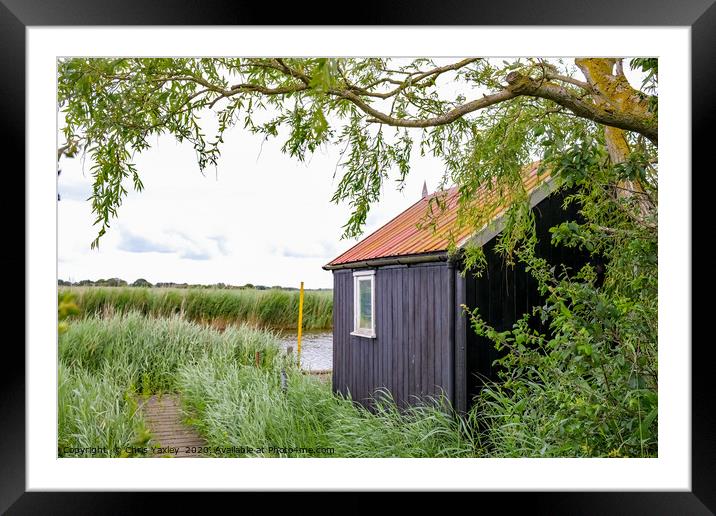 Wooden let on the waterfront of the River Bure Framed Mounted Print by Chris Yaxley
