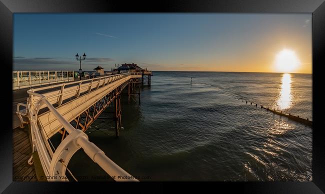 Fisheye view along Cromer Pier at sunrise Framed Print by Chris Yaxley