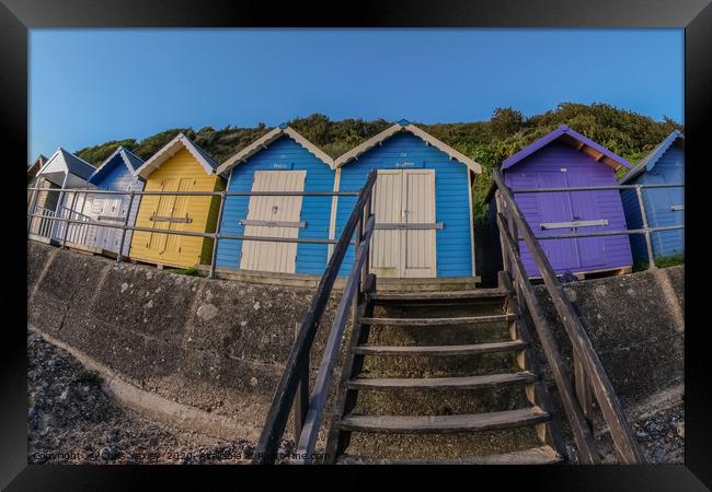 North Norfolk beach huts in the seaside town of Cr Framed Print by Chris Yaxley
