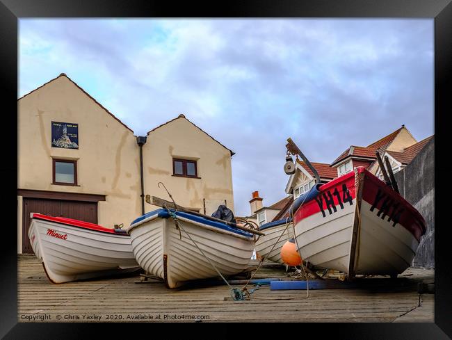 Low down and front on view of fishing boats Framed Print by Chris Yaxley