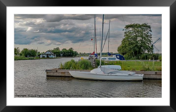 A view down the River Thurne in the Norfolk Broads Framed Mounted Print by Chris Yaxley