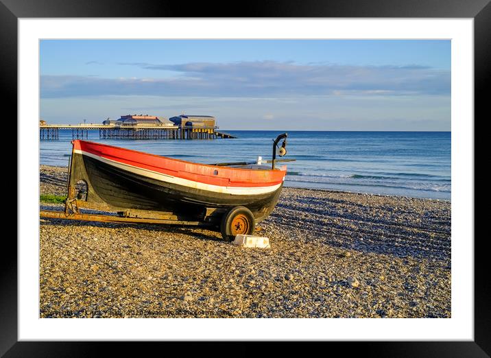Traditional crab fishing boat on Cromer beach at s Framed Mounted Print by Chris Yaxley