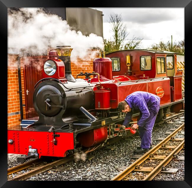 Working on the Mark Timothy steam train on the Bur Framed Print by Chris Yaxley