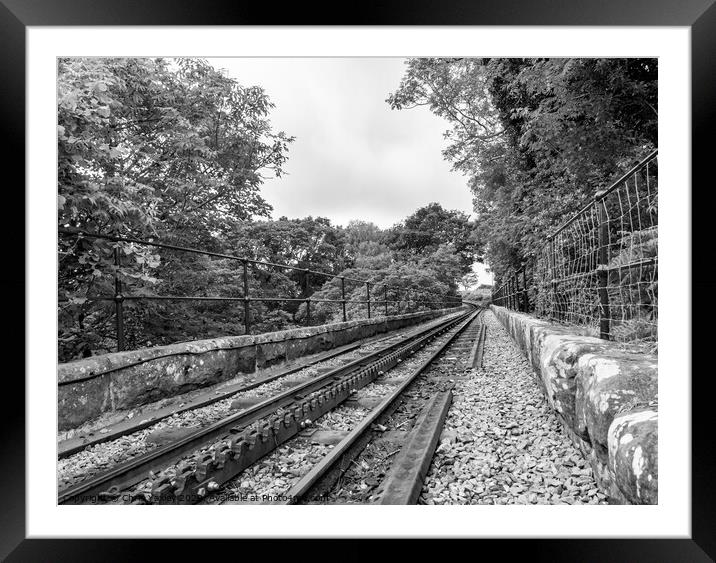 Mount Snowdon Railway, Llanberis, North Wales. The rack and pinion railway track running up Mount Snowdon Framed Mounted Print by Chris Yaxley