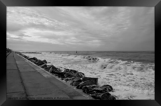 High tide at Cart Gap beach on an overcast evening Framed Print by Chris Yaxley